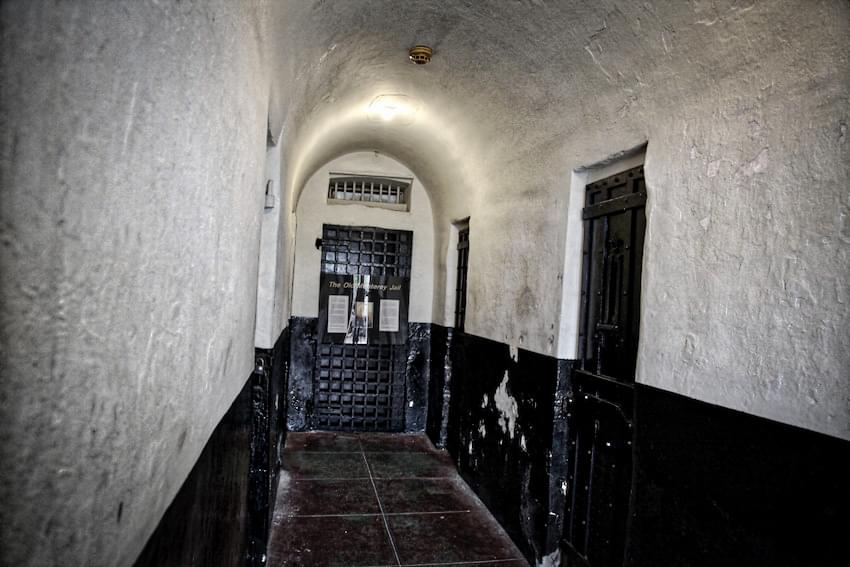 scary hallway with jail cells